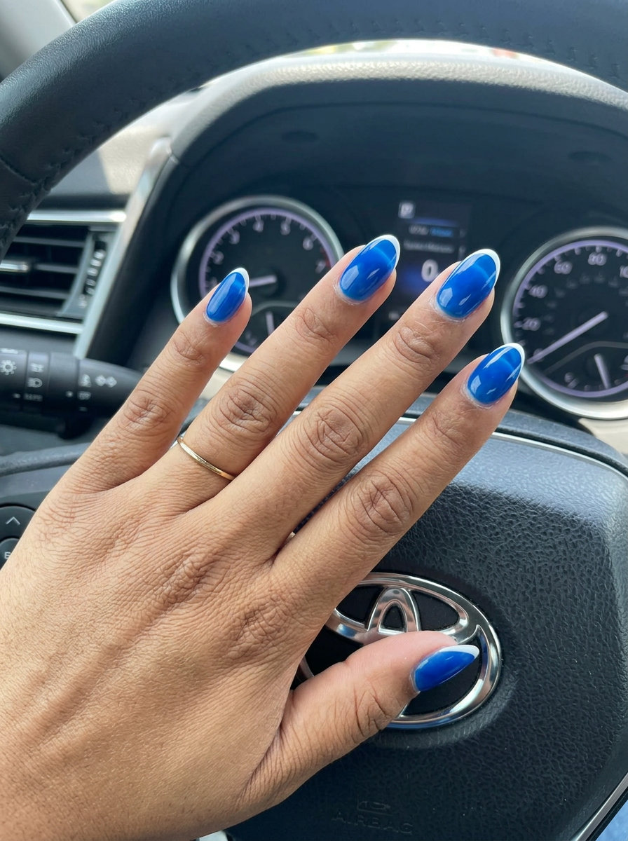 Solid Summer Nails 2026: Ocean Jelly Micro French Vibrant cobalt blue jelly micro French tips for a playful, refreshing vacation look in 2026. Chic and summery.