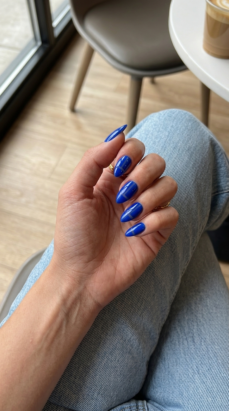 Electric blue negative space stiletto nails for stiletto summer nails 2026. Modern chic for daily wear.