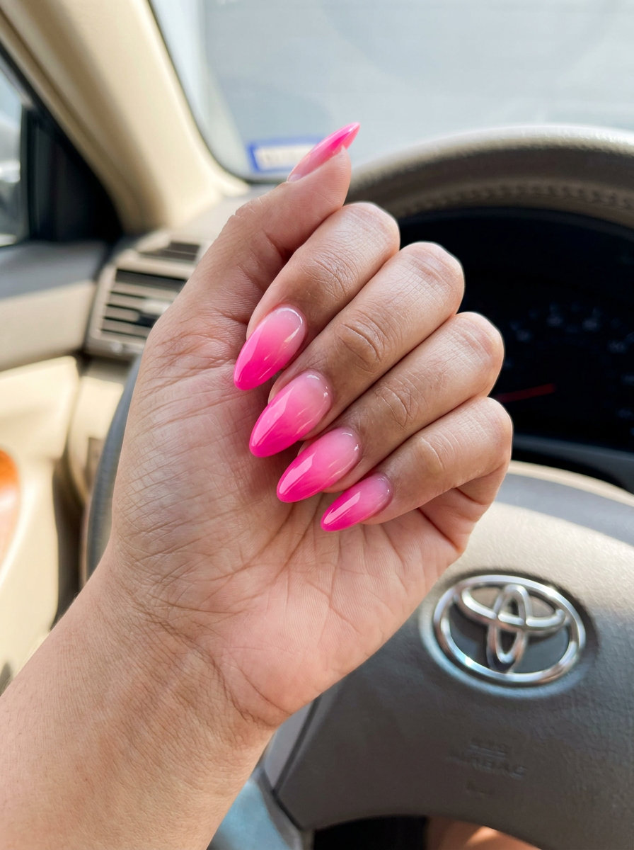Aura pink haze nails for summer 2026 date night outfits. Ethereal hot pink and soft pink gradient.