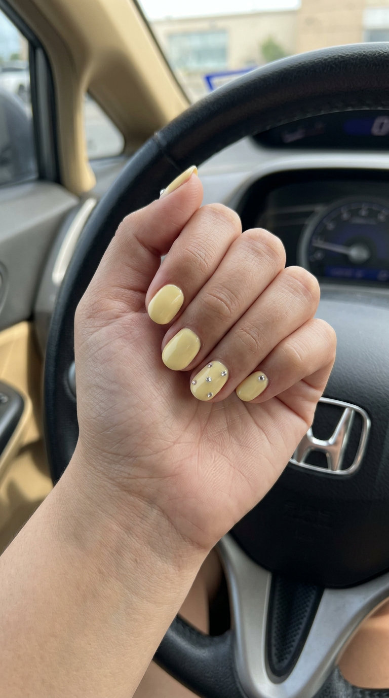 Pastel Yellow Rhinestone Nails 2026: Date Night Pastel yellow nails with rhinestone accents for summer 2026 date nights. Romantic, delicate sparkle.