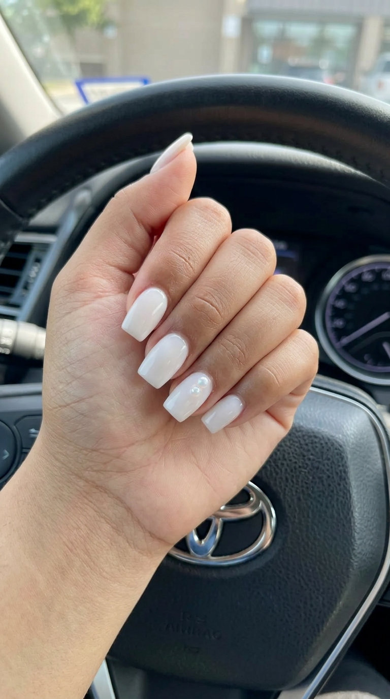 Pearl Accent Nails 2026: Sophisticated Summer Milky White with Pearl Accents Squoval nails for trending summer nails 2026.