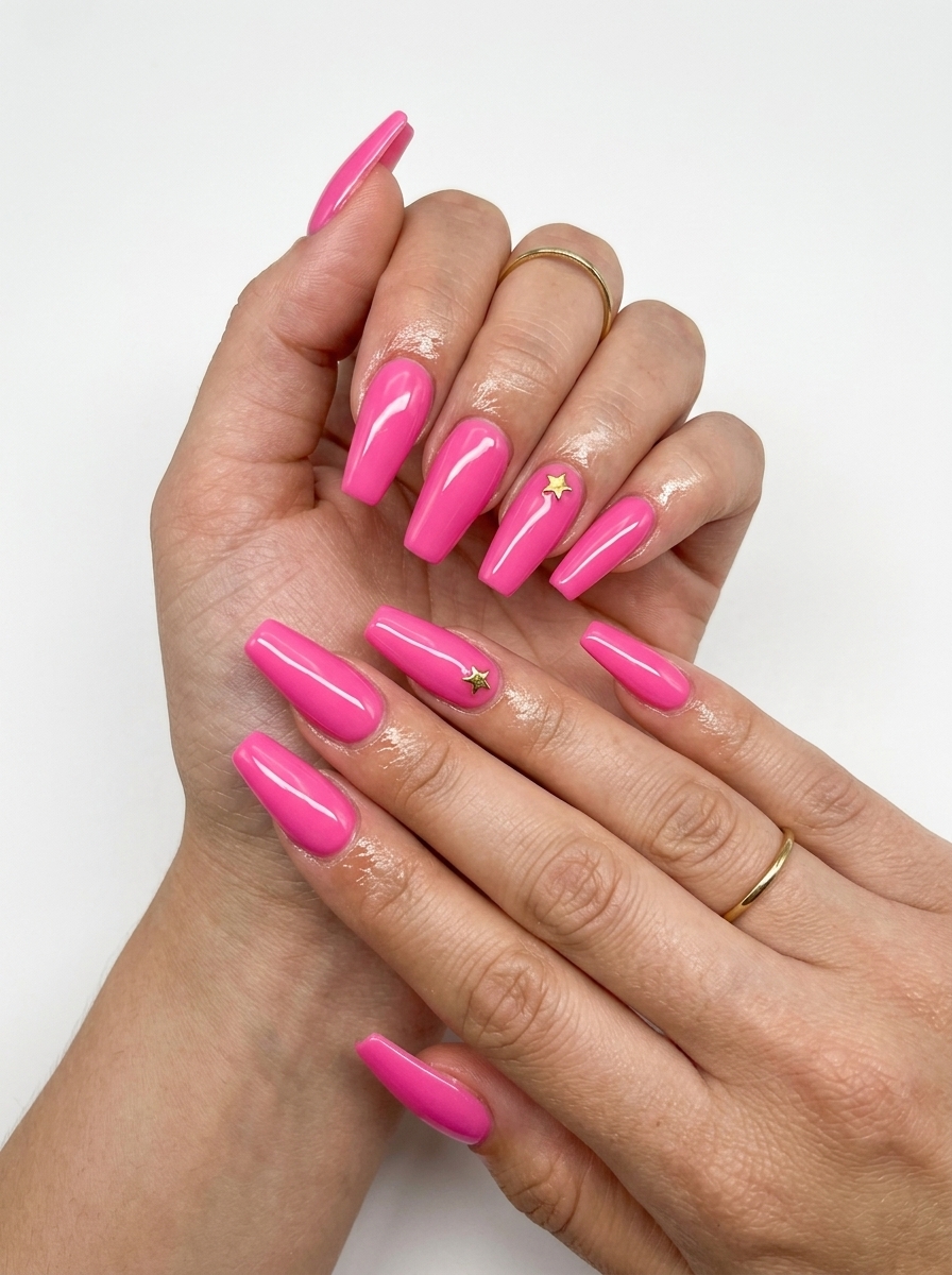 Hot pink coffin nails with a minimalist charm for vibrant nails summer 2026. Glamorous date night style.