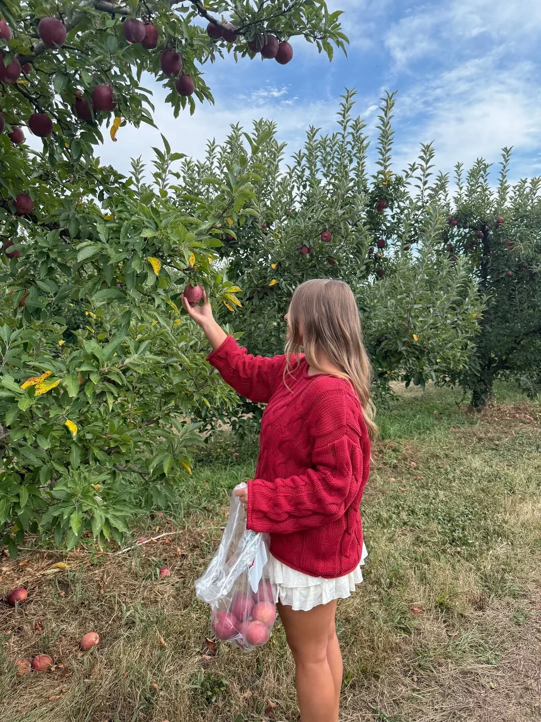 Early fall outfits ideas 2026 Chunky Red Sweaters Bring the Perfect Apple Picking Energy