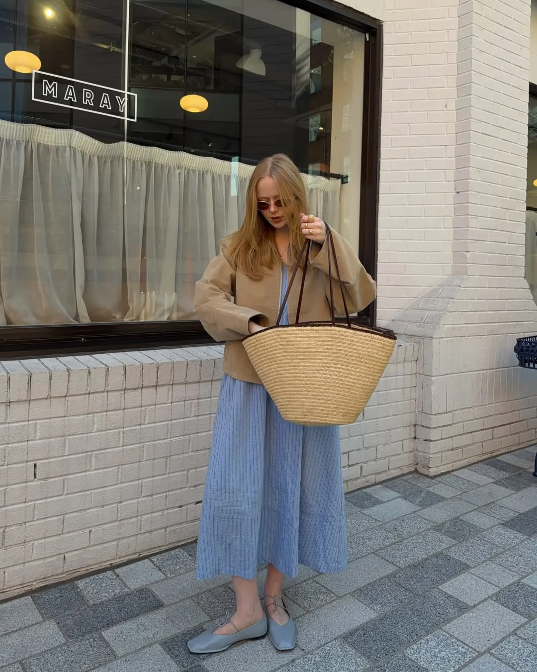 Early summer outfits 2026 Neutral Jackets And Blue Dresses For Quiet City Styling