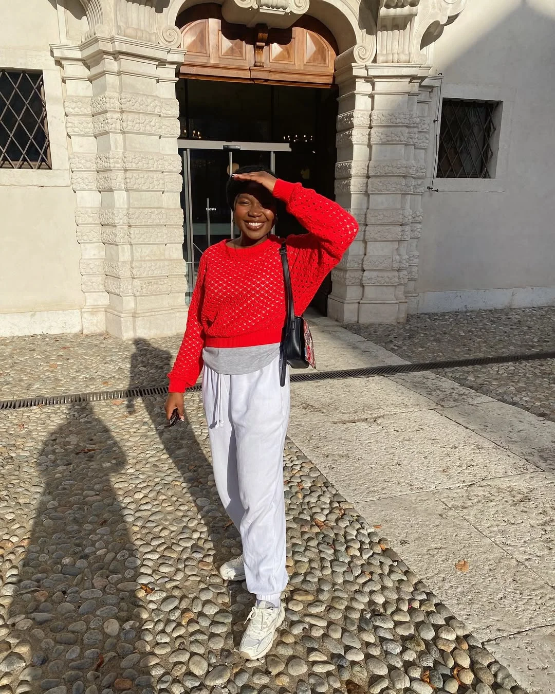 fall 2026 outfits for black women A Bold Red Knit That Makes Everyday Dressing Feel Exciting