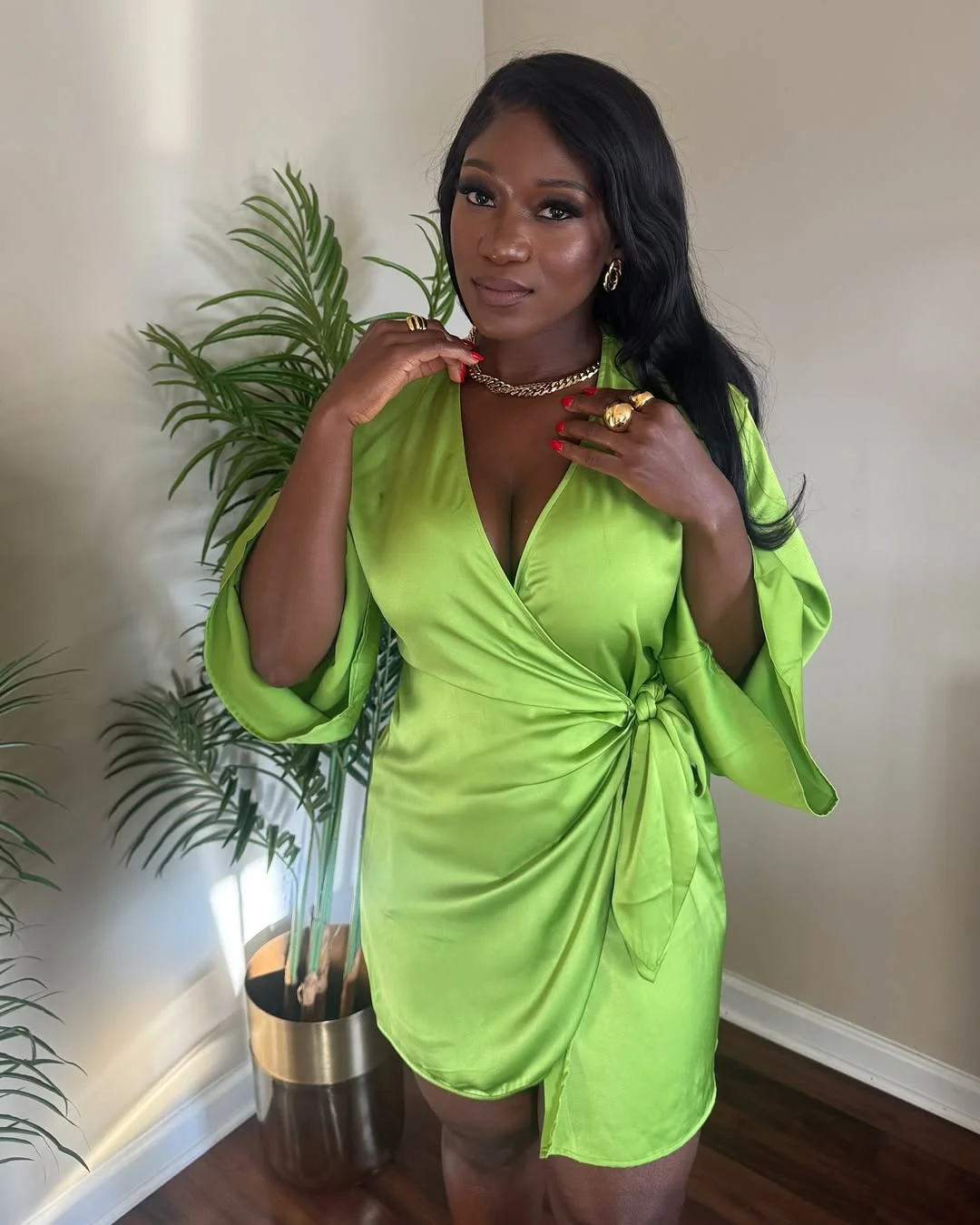 fall 2026 outfits for black women A Vibrant Green Wrap Dress That Brightens Gray Fall Days