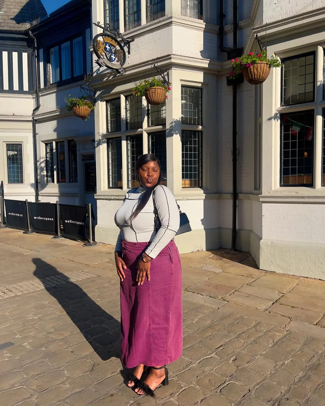 fall 2026 outfits for black women A Rich Plum Maxi Skirt That Reinvents Fall Neutrals