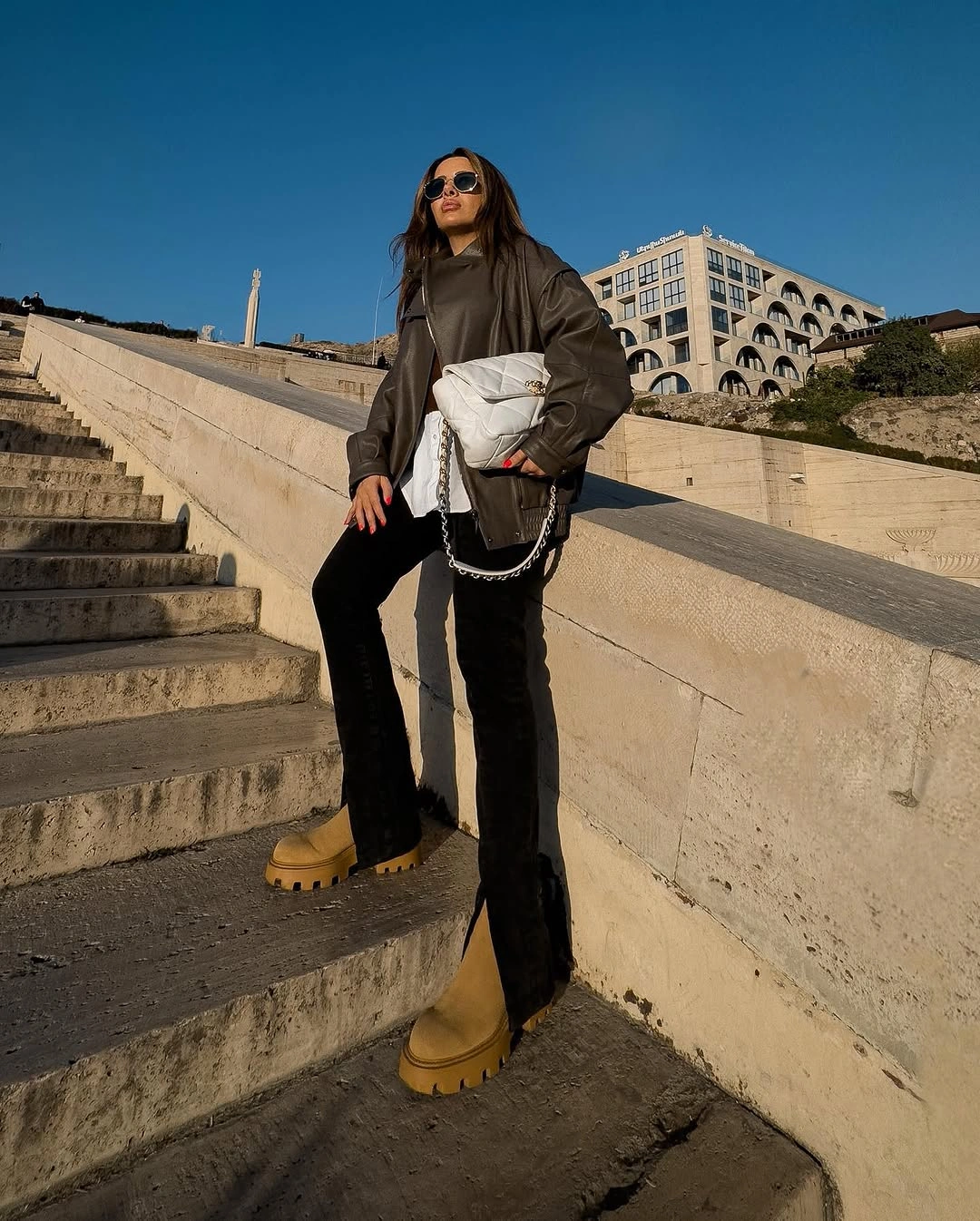 fall going out outfits 2026 Oversized Leather and Statement Boots with Modern Edge
