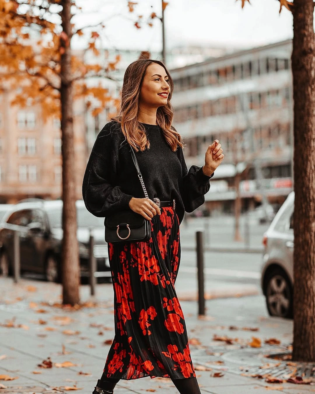 fall going out outfits 2026 Black Knit and Floral Midi Skirt for Romantic Autumn Nights