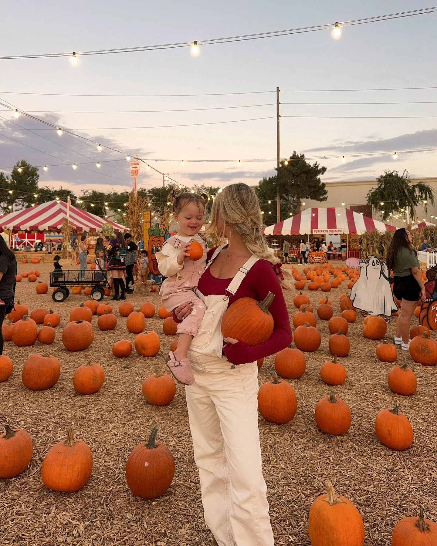 fall mom outfits 2026 White Overalls With Rich Burgundy Layers For Pumpkin Patch Days