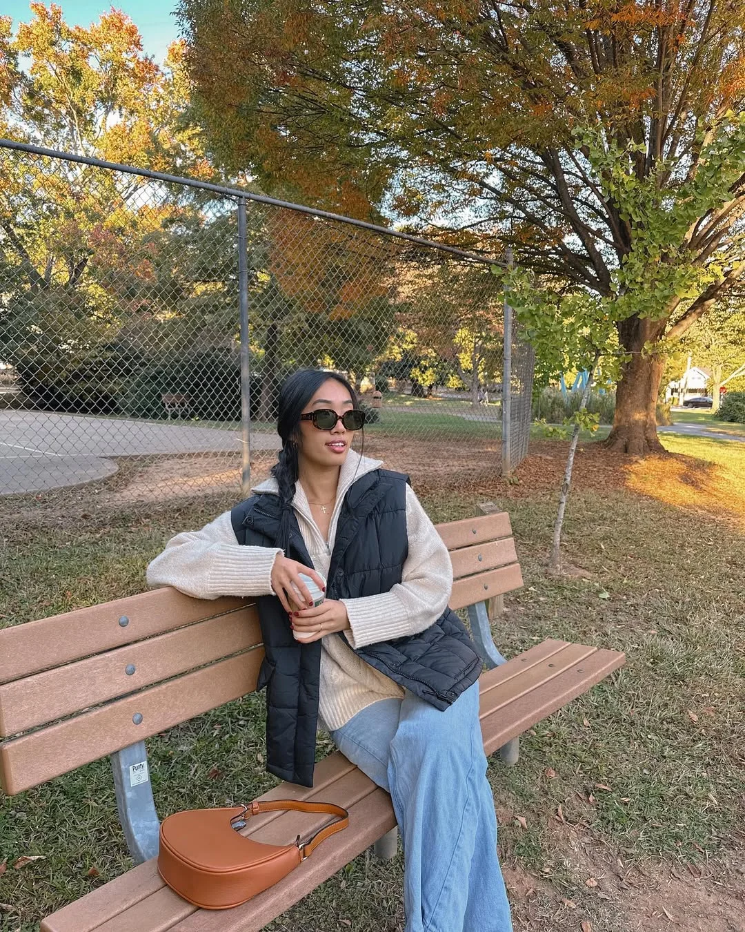 fall outfits for women in 30s style 2026 Layered Knitwear and a Puffer Vest for Relaxed Park Days
