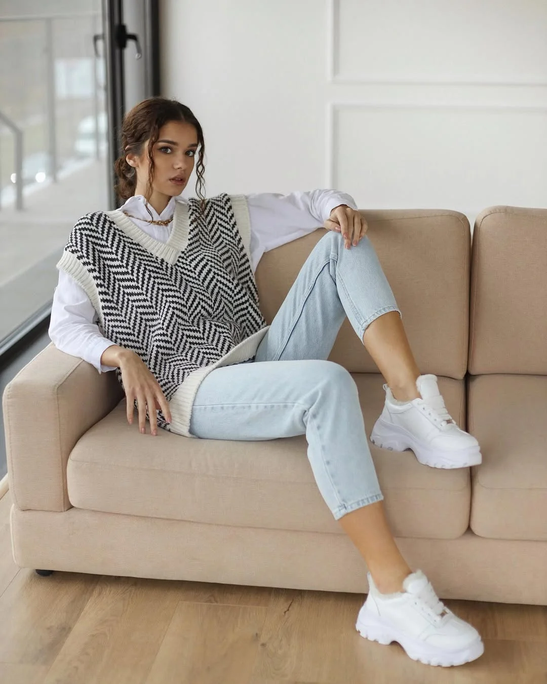 fall outfits with jeans and sneakers 2026 Classic Sweater Vest Styling with Light Denim