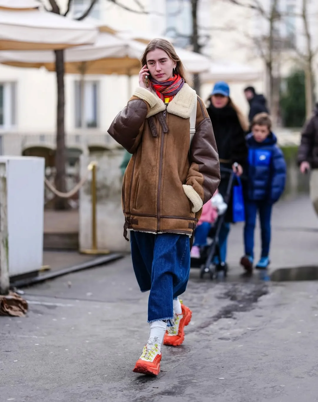 fall outfits with jeans and sneakers 2026 Oversized Shearling Jackets with Statement Sneakers