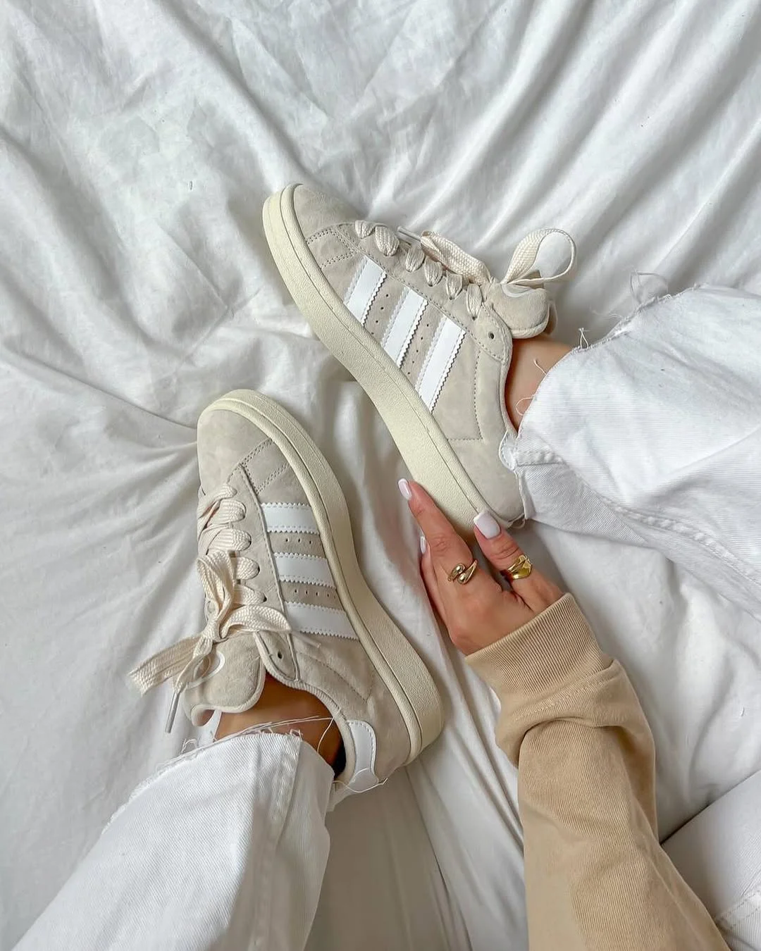 fall outfits with sneakers 2026 Minimalist Cream Sneakers for Everyday Chic
