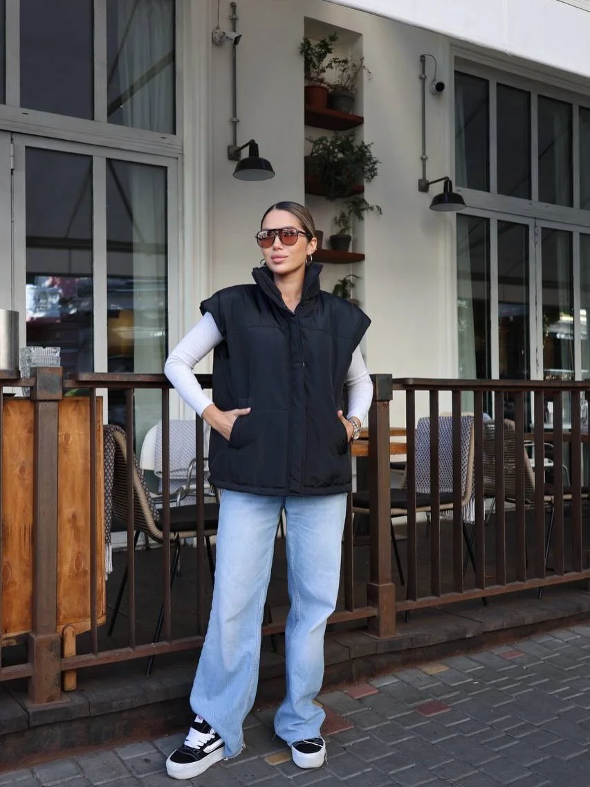 fall outfits with vests 2026 Relaxed Black Puffer Vest with Everyday Denim