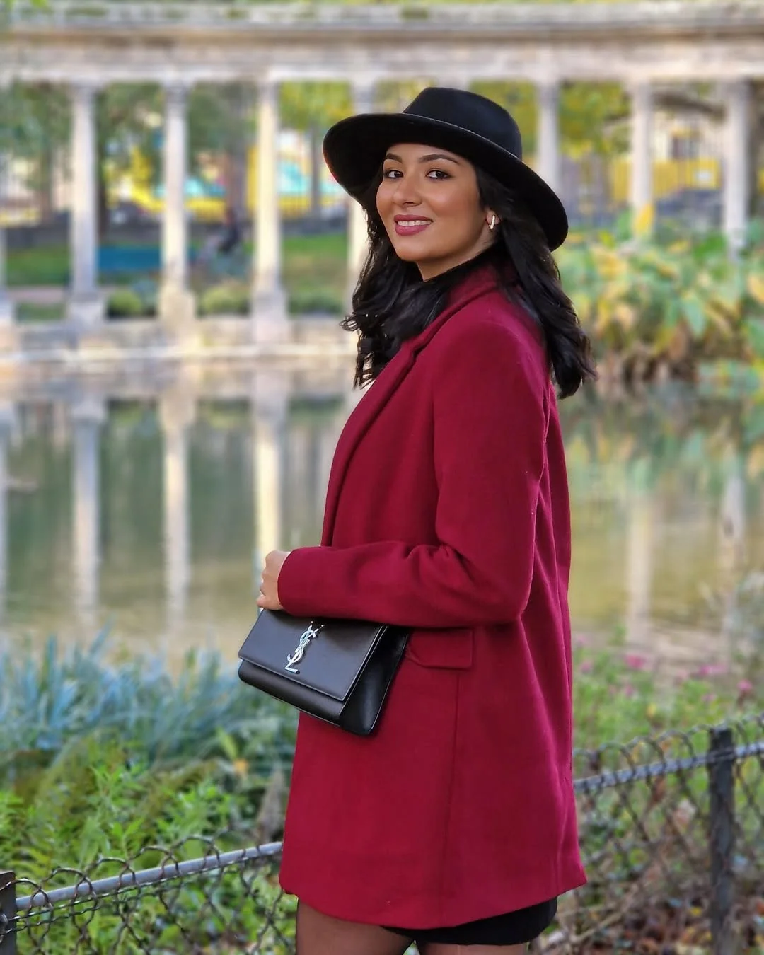 fall travel wardrobe for women 2026 A Burgundy Coat That Brings Instant Autumn Elegance
