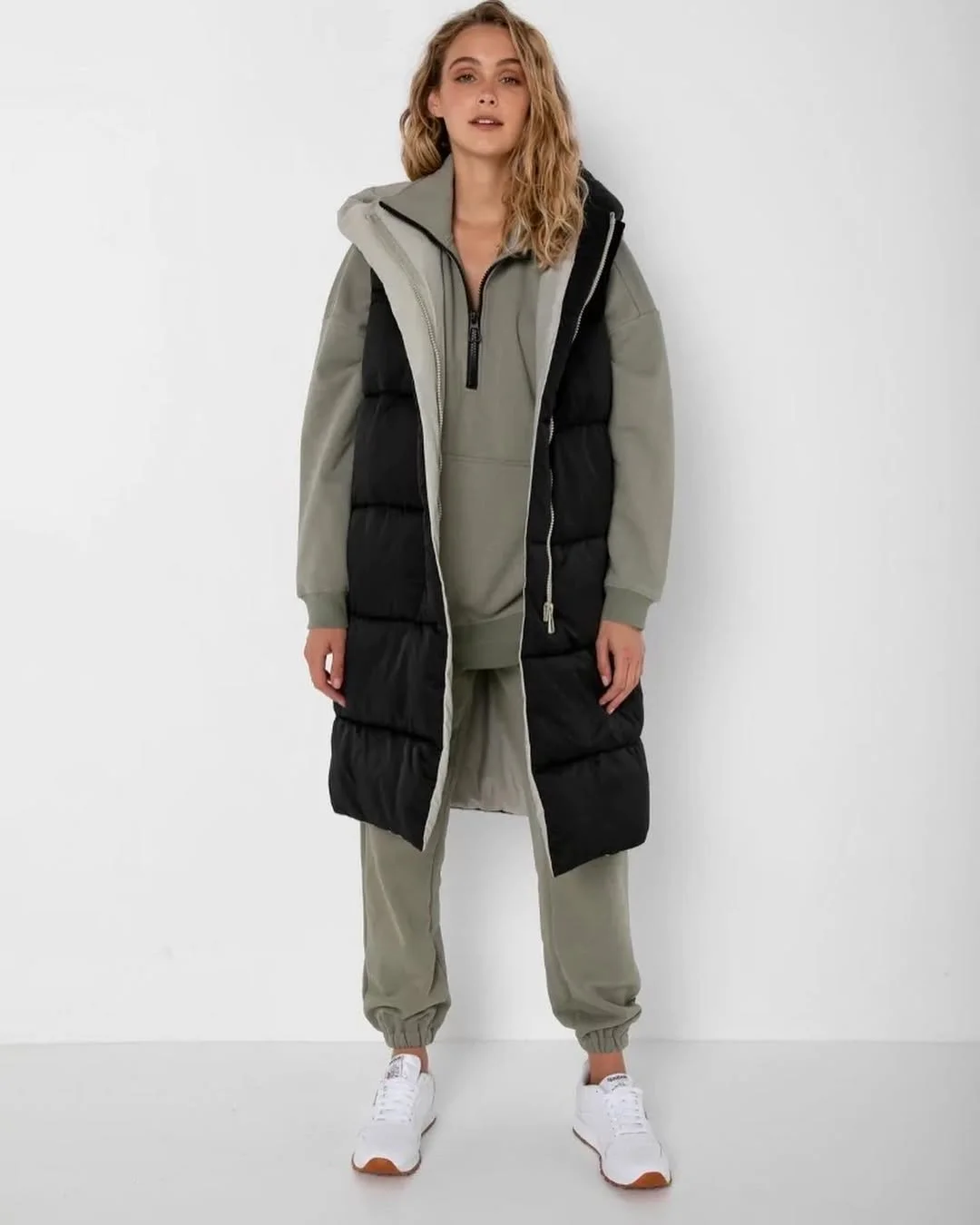 fall vest outfits for women 2026 Sporty Black Puffer Vest with an Olive Green Set