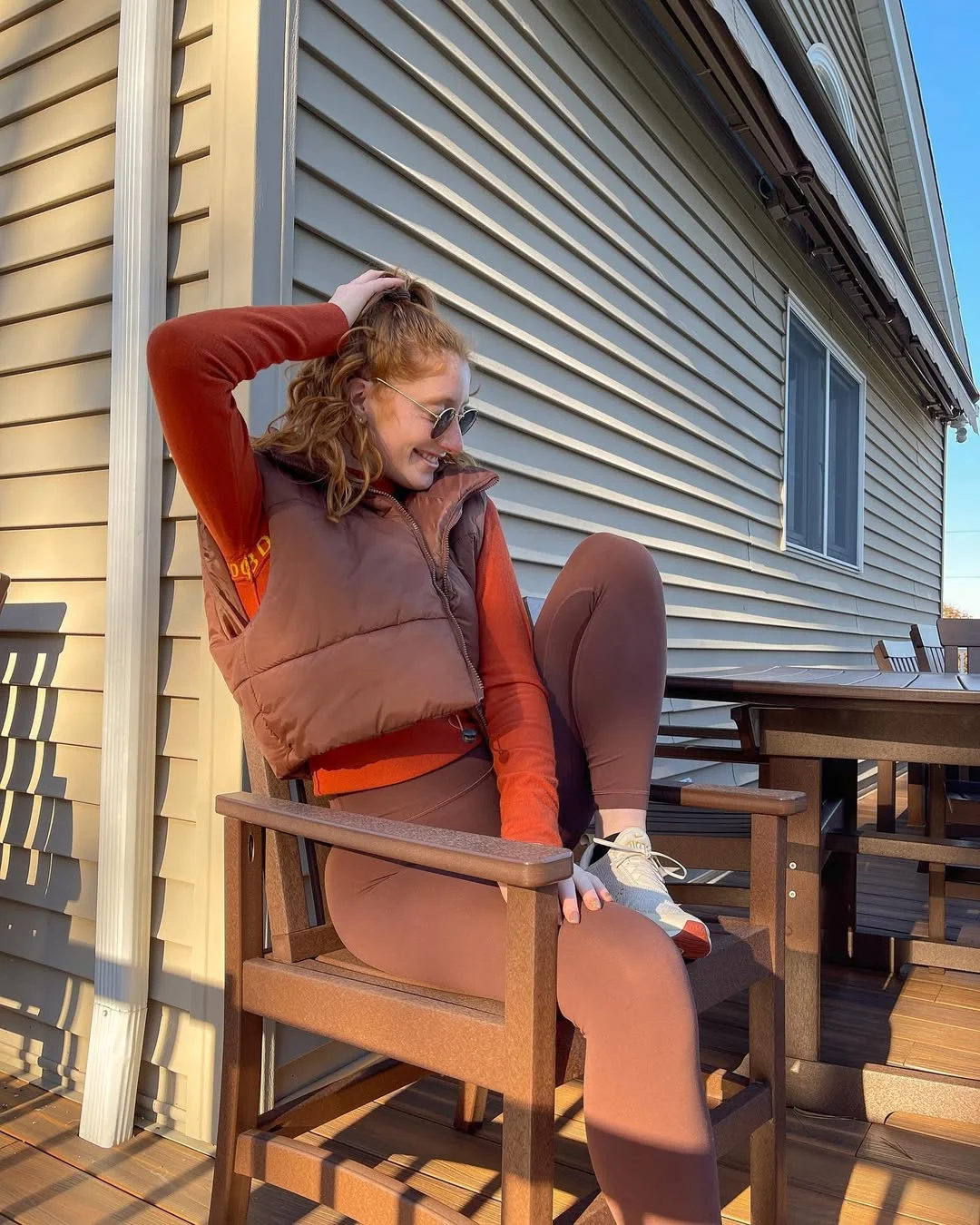 fall vest outfits for women 2026 Casual Athleisure with a Chocolate Puffer Vest