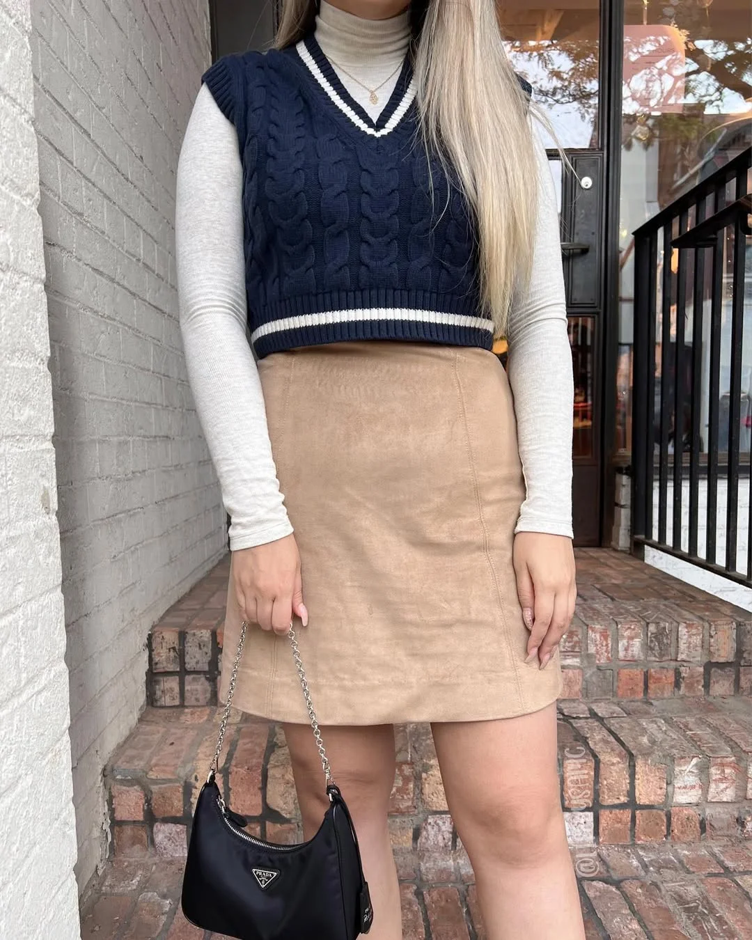 fall vest outfits for women 2026 Preppy Knit Vest with a Soft Tan Mini Skirt