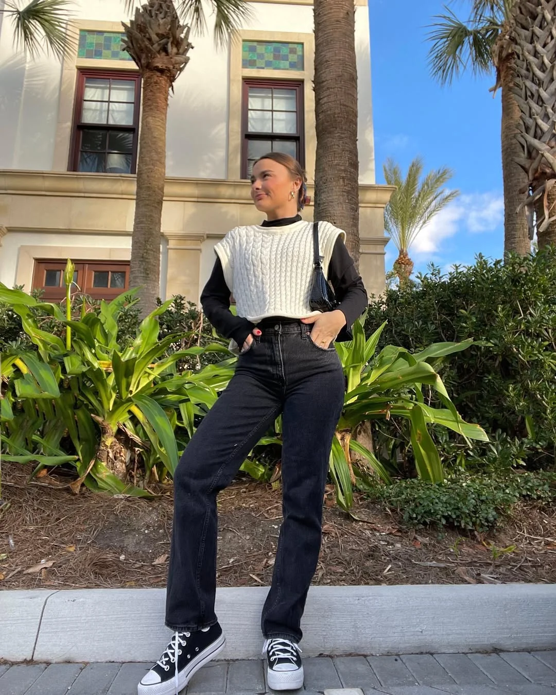 fall vest outfits for women 2026 Black and White Contrast with a Cable Knit Vest