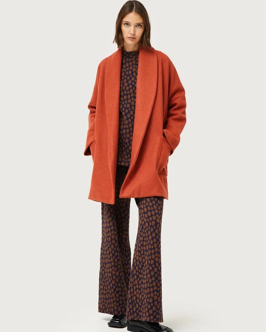 New trends: fall fashion 2026 Warm Rust Coats and Retro Prints Are Bringing Back Artistic Fall Fashion