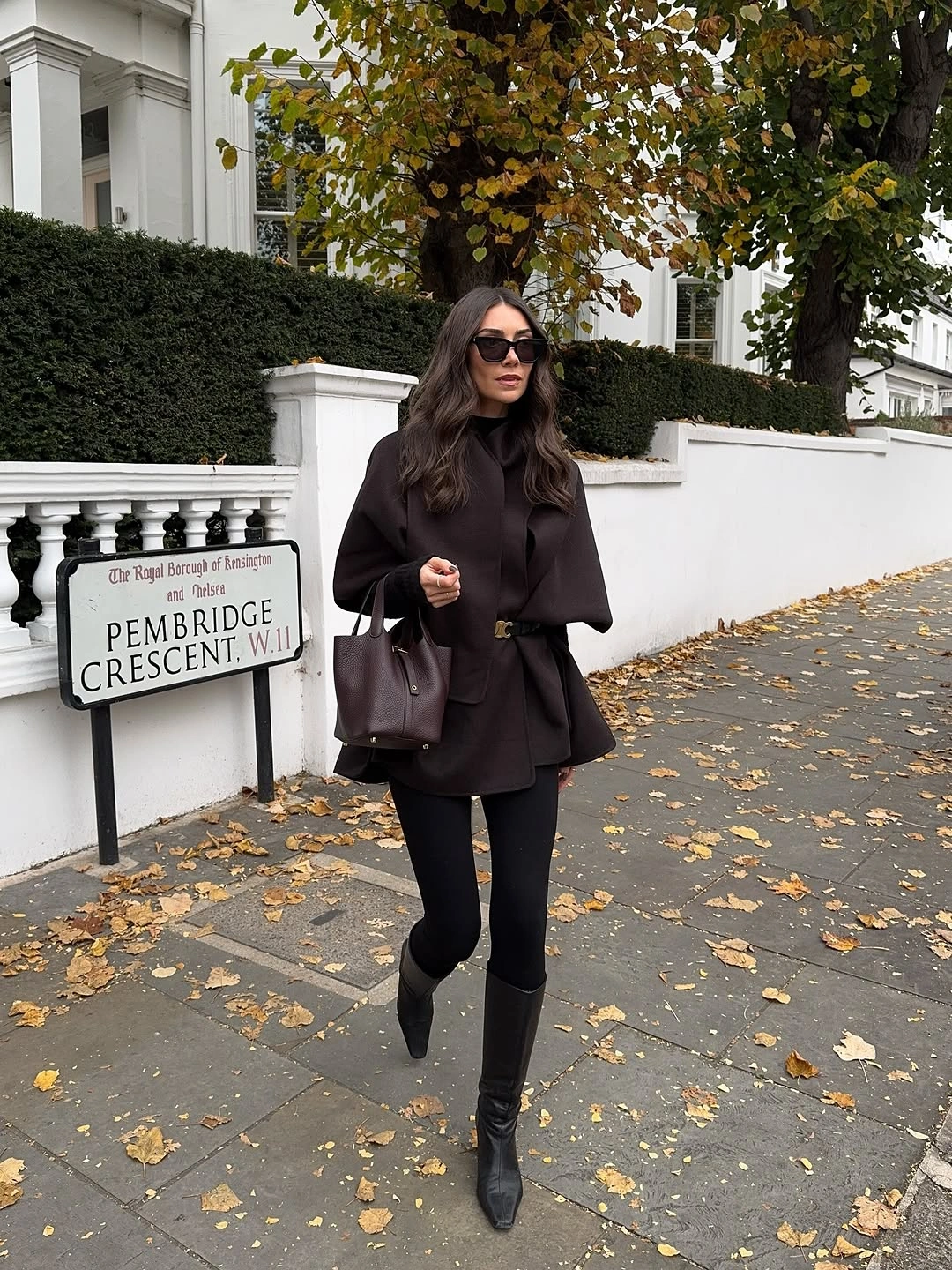 nice fall outfits 2026 Minimal Cape Styling That Makes Black Feel Anything But Basic