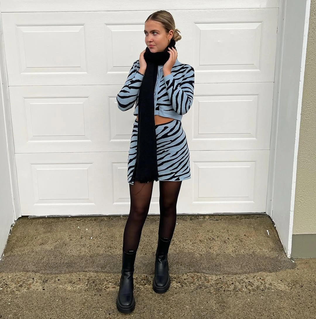 nice fall outfits 2026 Bold Zebra Knit That Brings Playful Energy To Fall Layers