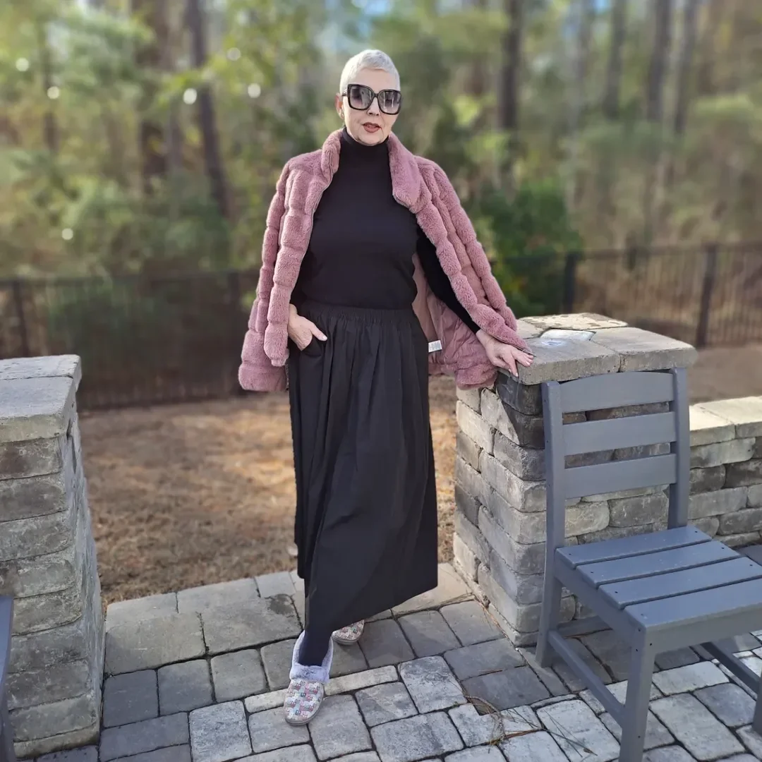 what to wear in fall 2026 over 50 Soft Faux Fur and Black Monochrome for Cold Fall Days