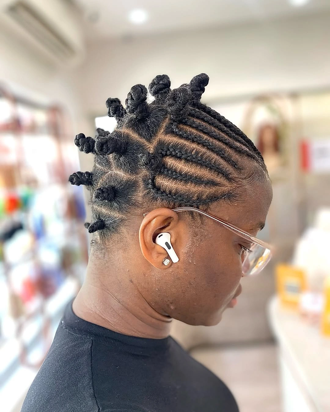 bantu knots hairstyles Precision Cornrows Flowing into Compact Bantu Knots