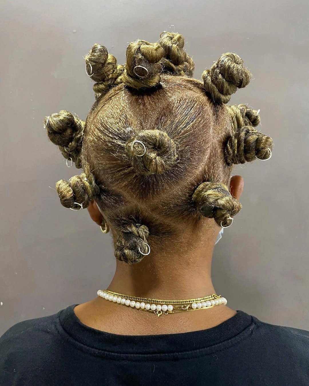bantu knots hairstyles Minimalist Olive-Toned Bantu Knots with Modern Accessories
