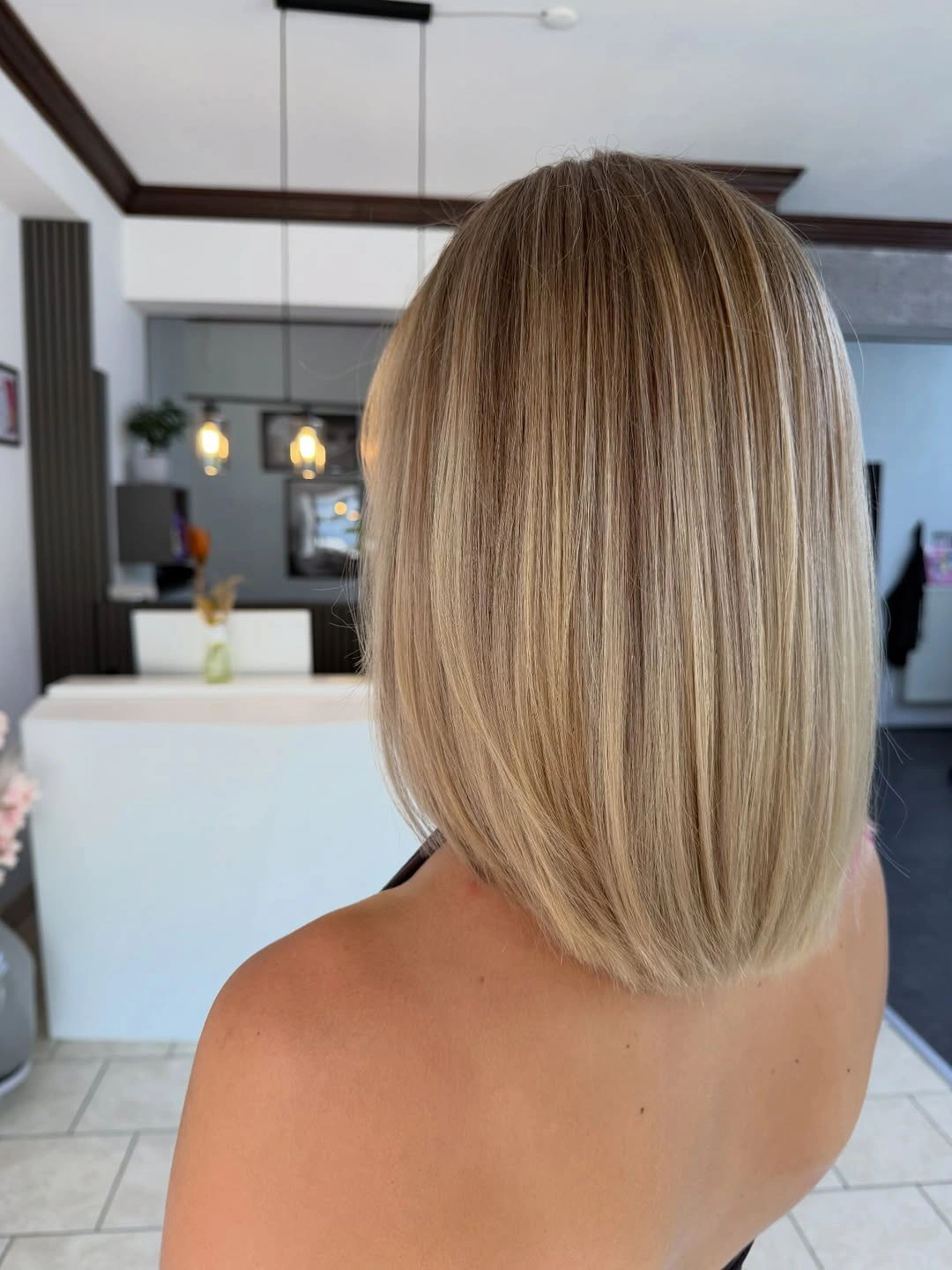 beige blond hair color Precision Beige Blonde Blunt Lob with Seamless Dimension