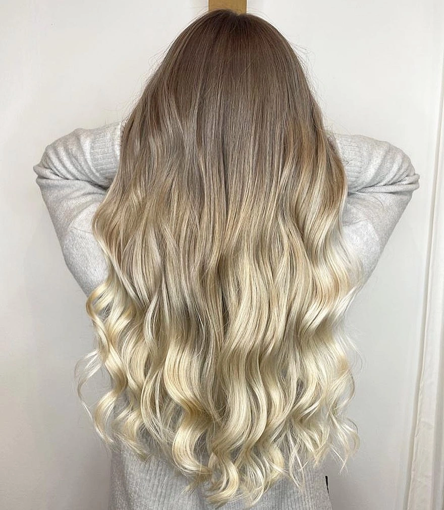 beige blond hair color Beige Blonde Ombre with Soft Romantic Waves