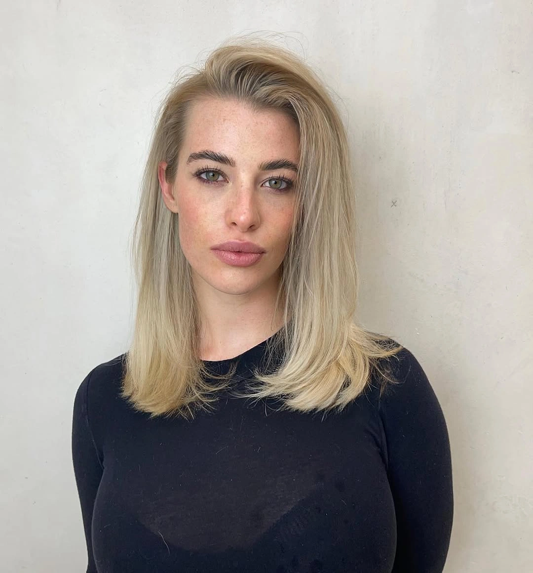 beige blond hair color Sleek Cool Beige Blonde for a Minimalist Look