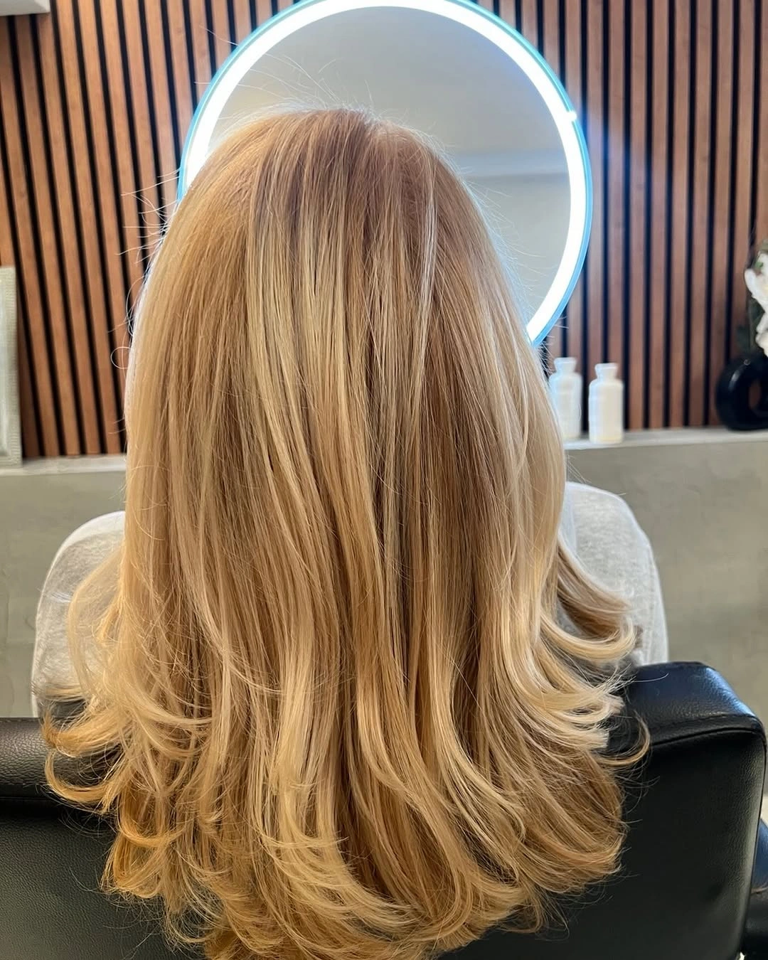 beige blond hair color Long Beige Blonde with Feathered Ends and Glossy Movement