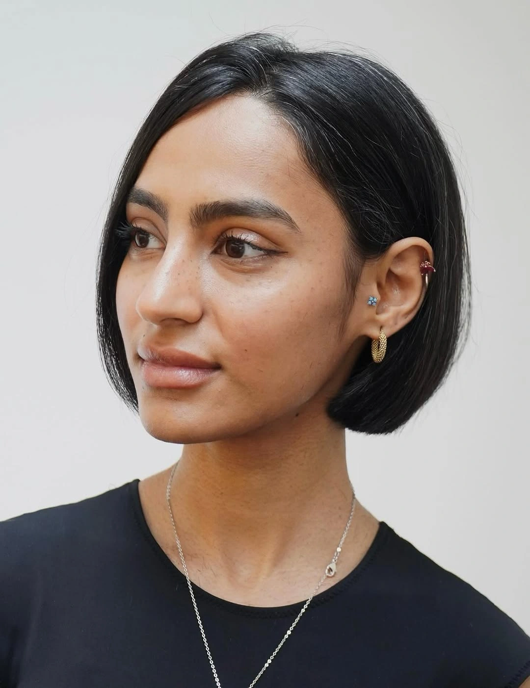 bob hairstyles for black women Minimal Black Bob With Tucked Side Profile