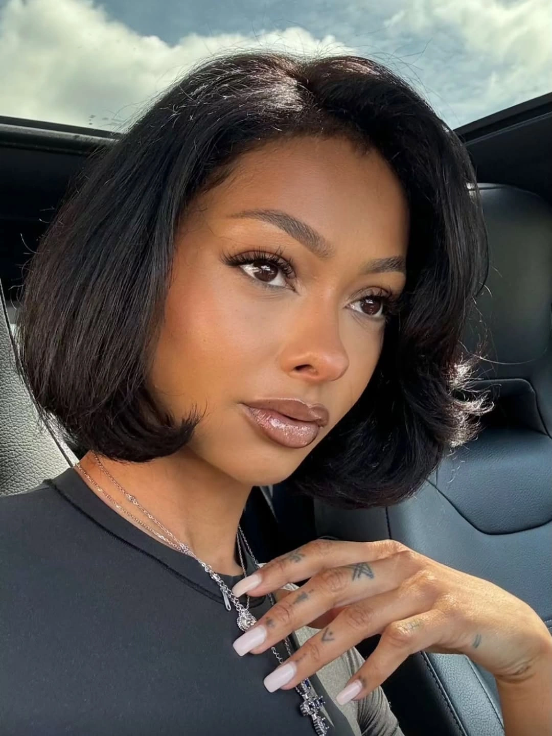 bob hairstyles for black women Rounded Side-Part Bob With Flipped Ends