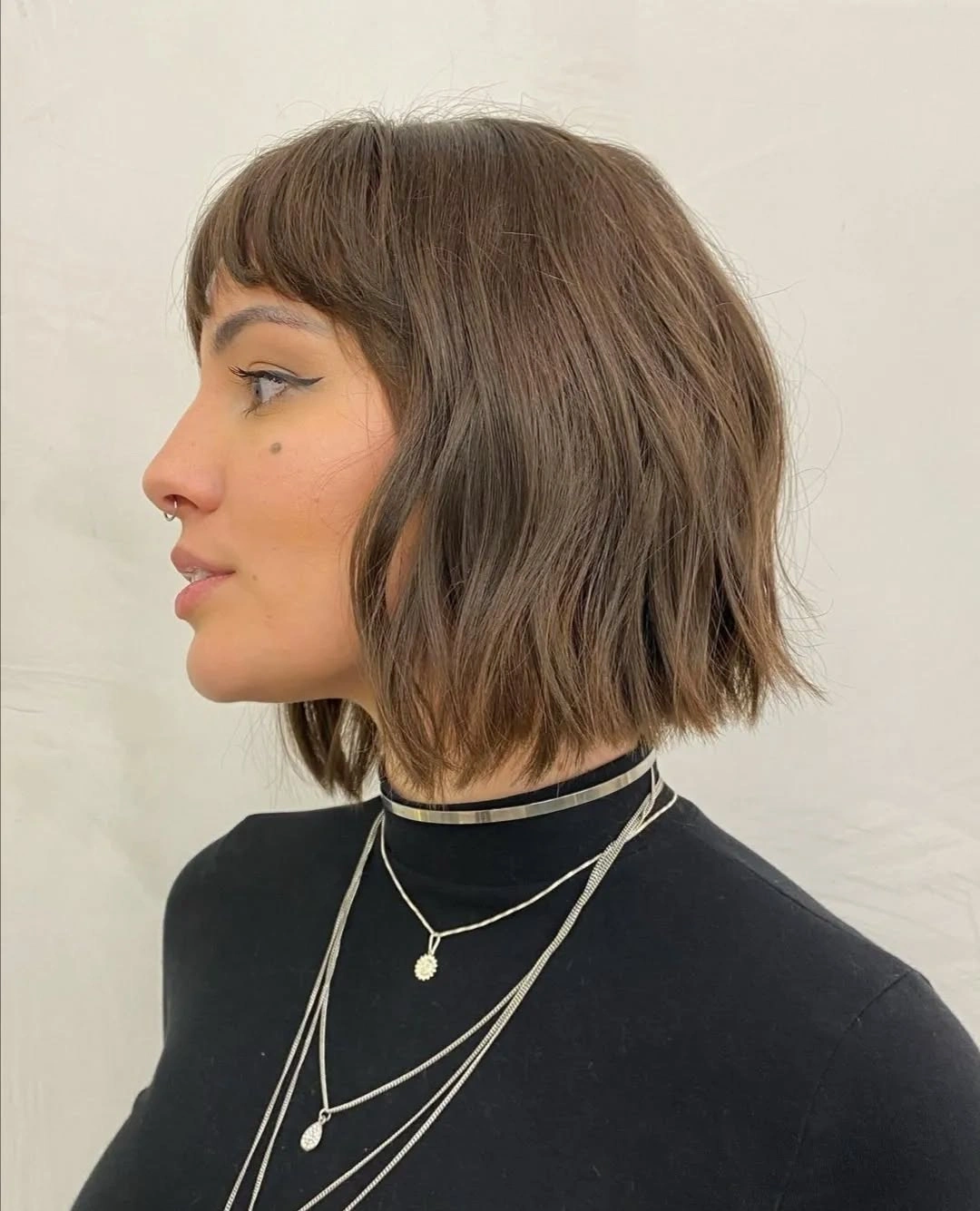bobbed haircut for women Relaxed Textured Bob With Soft Micro Bangs