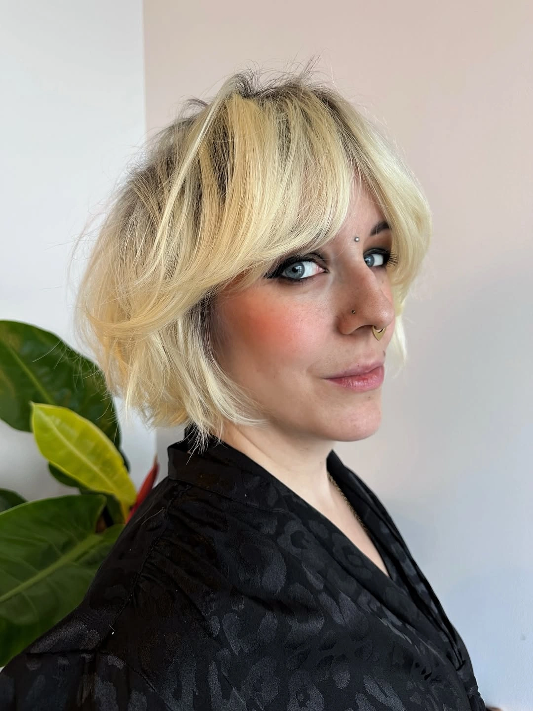 bobbed haircut for women Voluminous Blonde Bob With Feathered Curtain Bangs