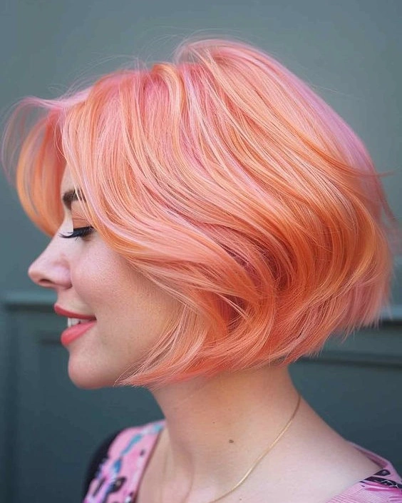 bobbed haircut for women Soft Peach Bob That Turns Color Into the Main Character