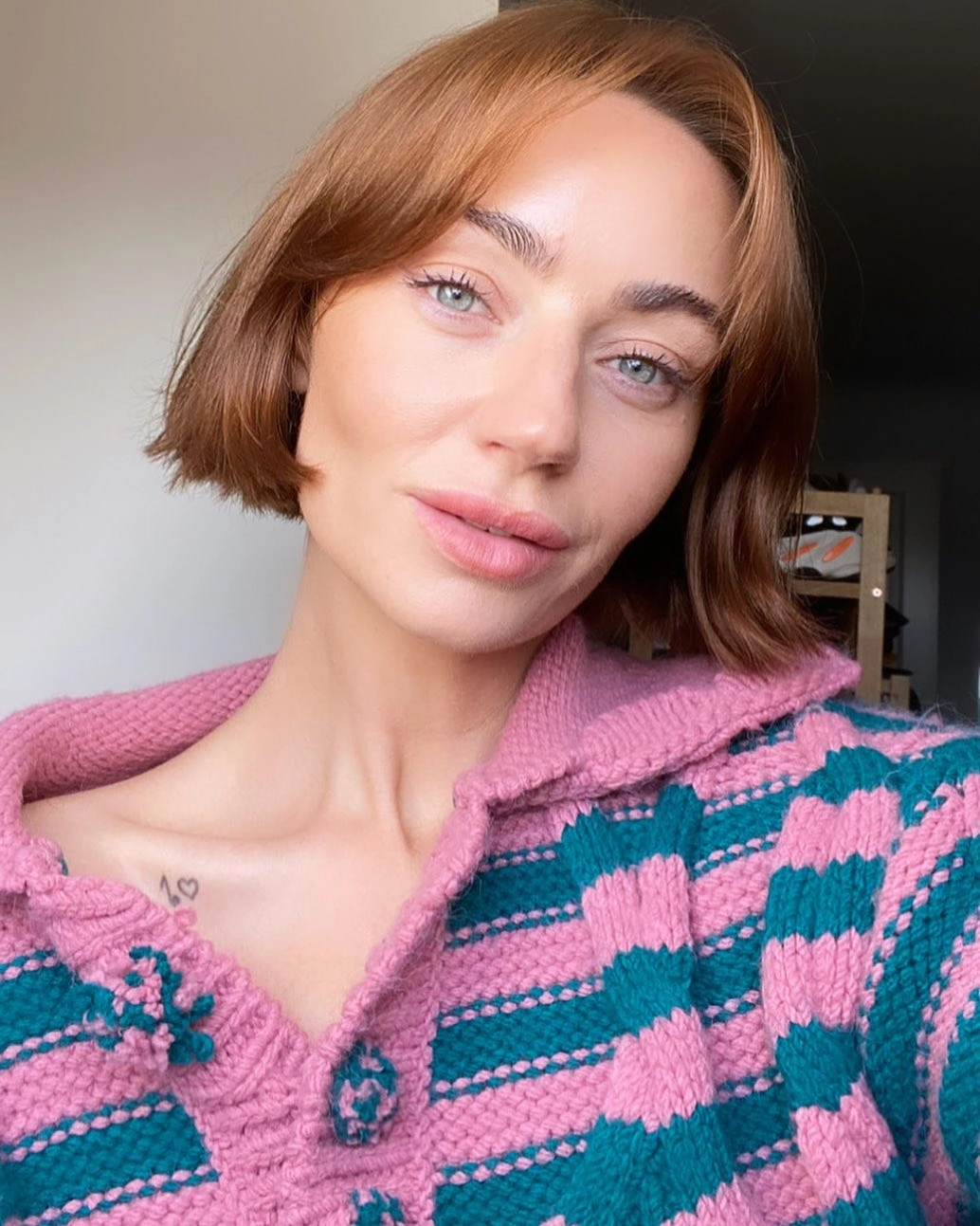 bobbed haircut for women Soft Cinnamon Bob With Face-Framing Curtain Bangs