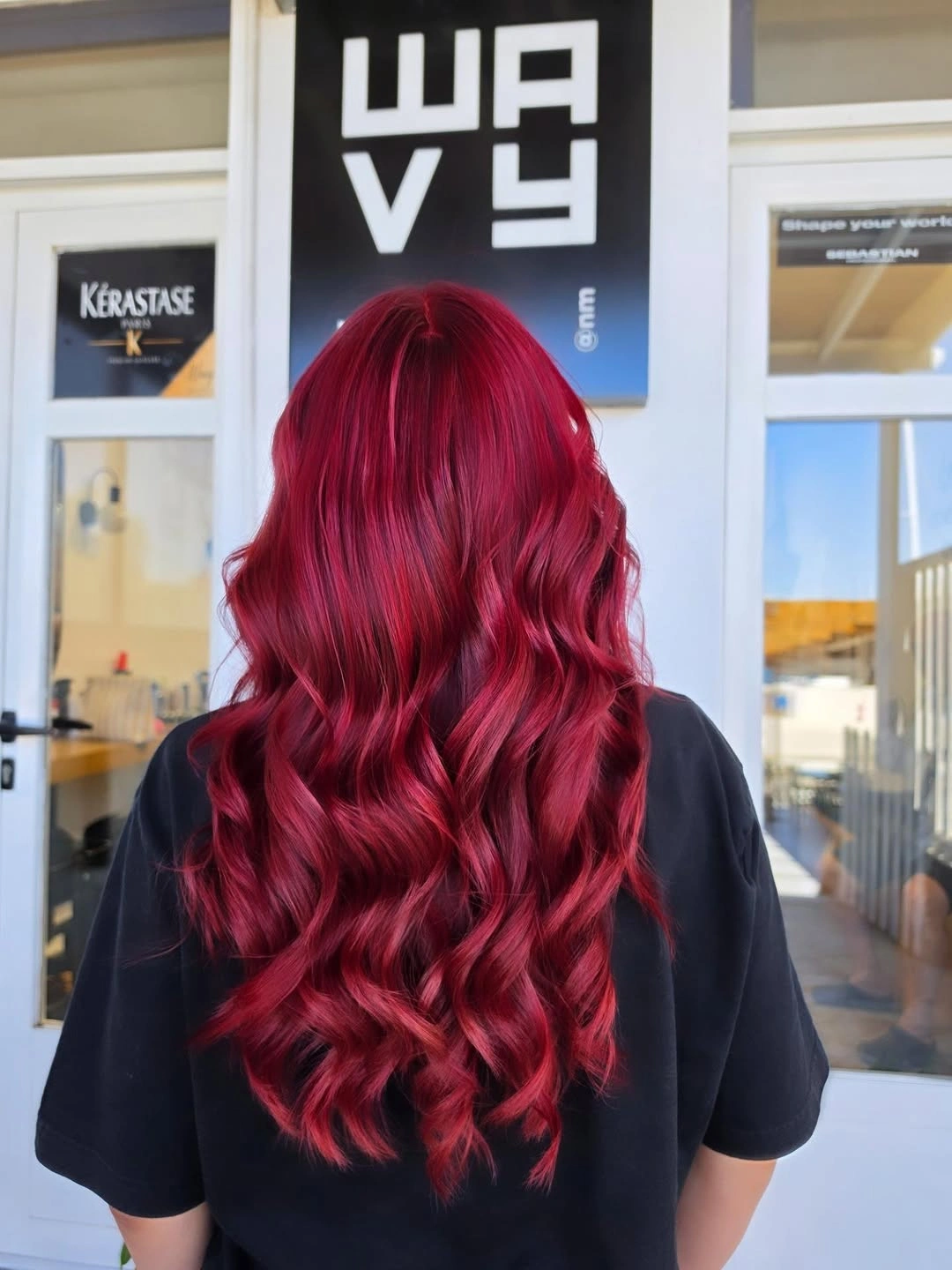 body waves hairstyle Bold Ruby Red Waves That Steal Every Bit of Attention