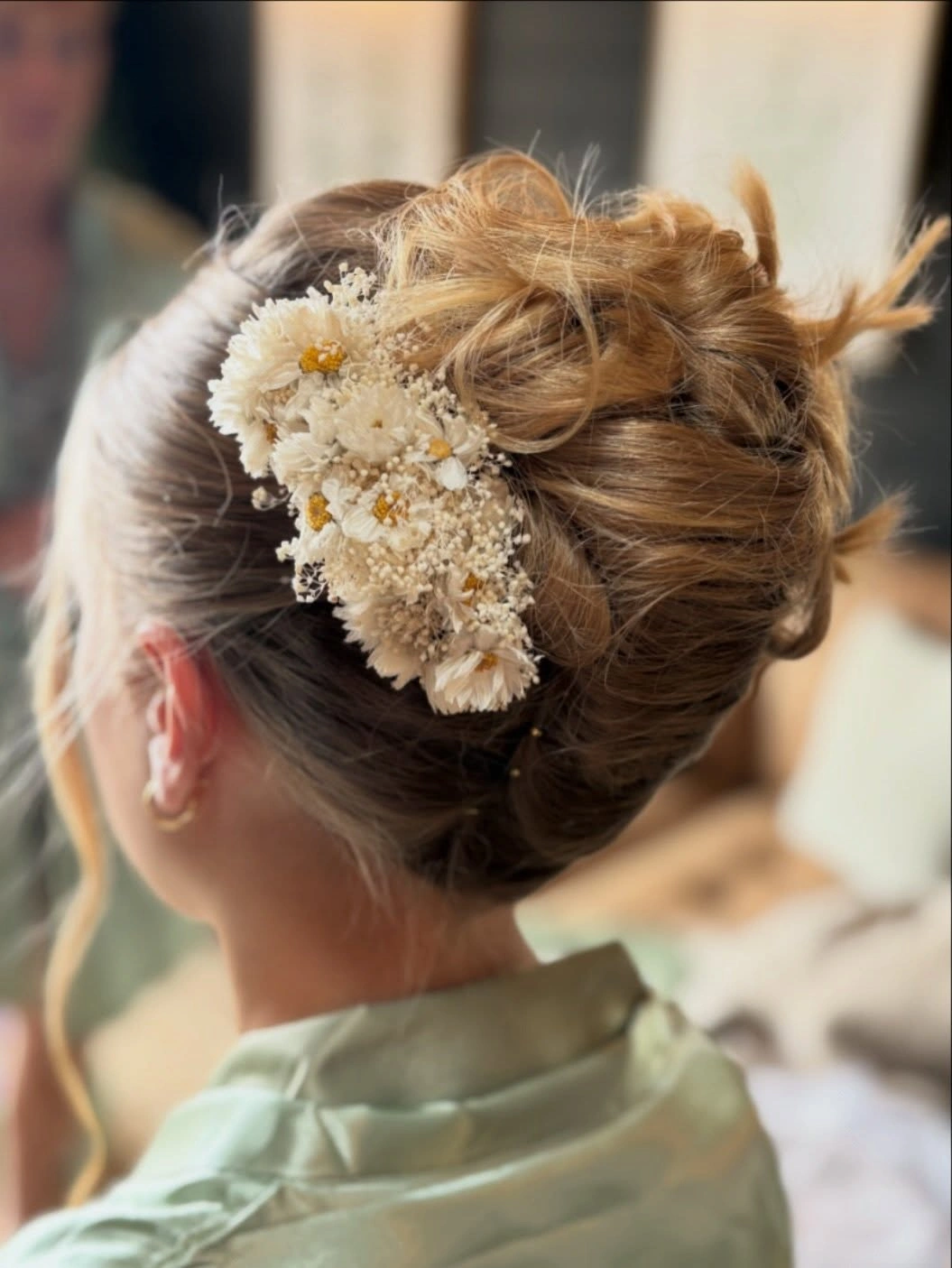 bridesmaid hairstyling Romantic Floral Updo That Feels Soft and Timeless