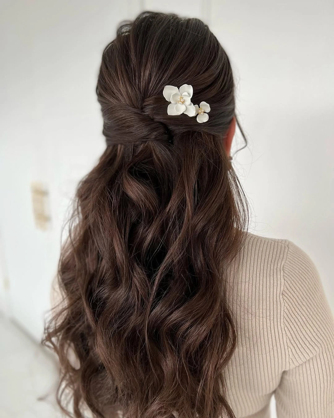 bridesmaid hairstyling Soft Twisted Half-Up Waves With Delicate Floral Pins