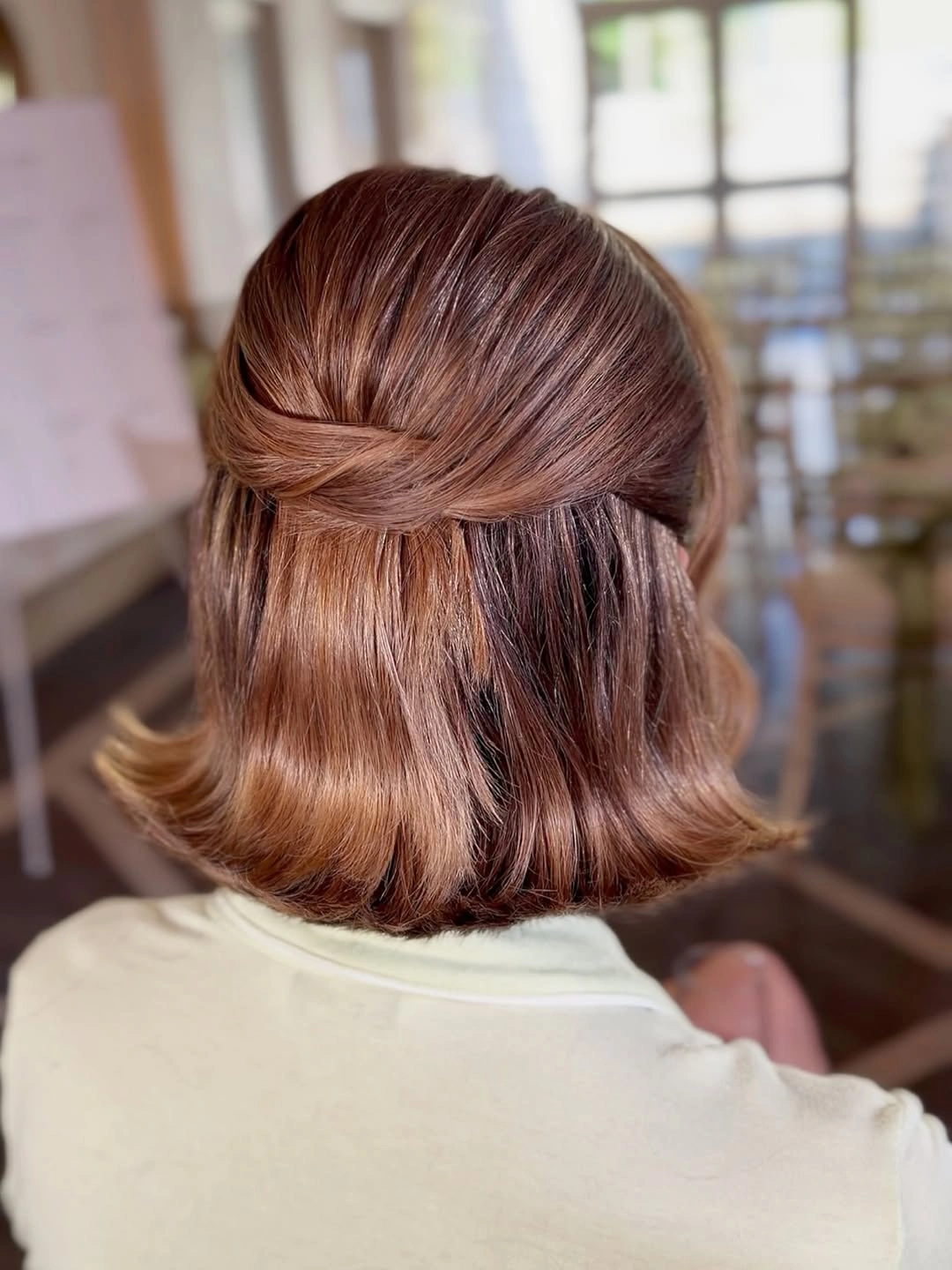 bridesmaid hairstyling Elegant Twisted Half-Up Style for a Classic Bridal Party