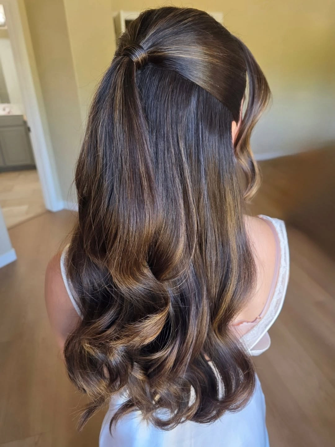 bridesmaid hairstyling Classic Half-Up Glamour With Flowing Waves