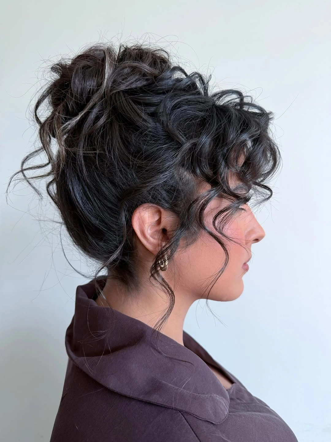bridesmaid hairstyling Textured Curly Updo With Effortless Movement