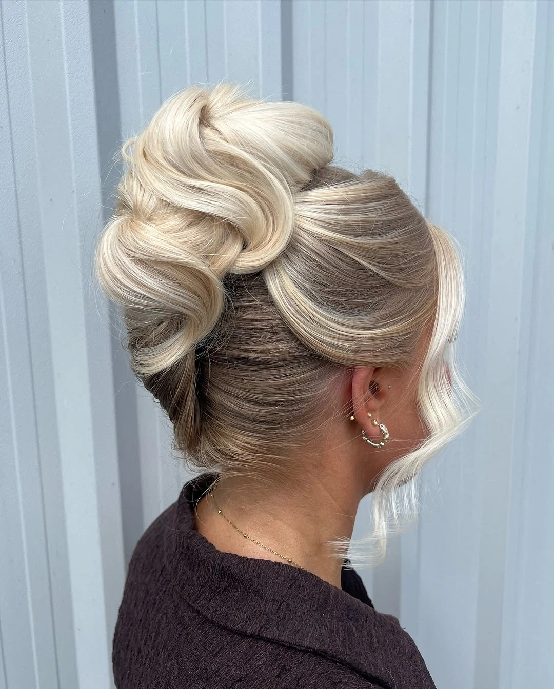 bridesmaid hairstyling Modern Sculpted Bun With Hollywood Glamour