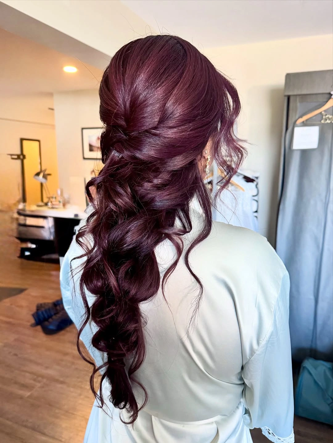 bridesmaid hairstyling Romantic Twisted Low Ponytail With Cascading Waves