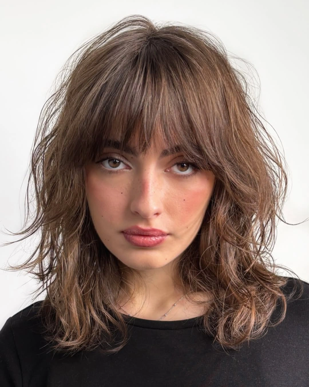 chestnut brown hair color Soft Chestnut Shag With Wispy Face-Framing Bangs