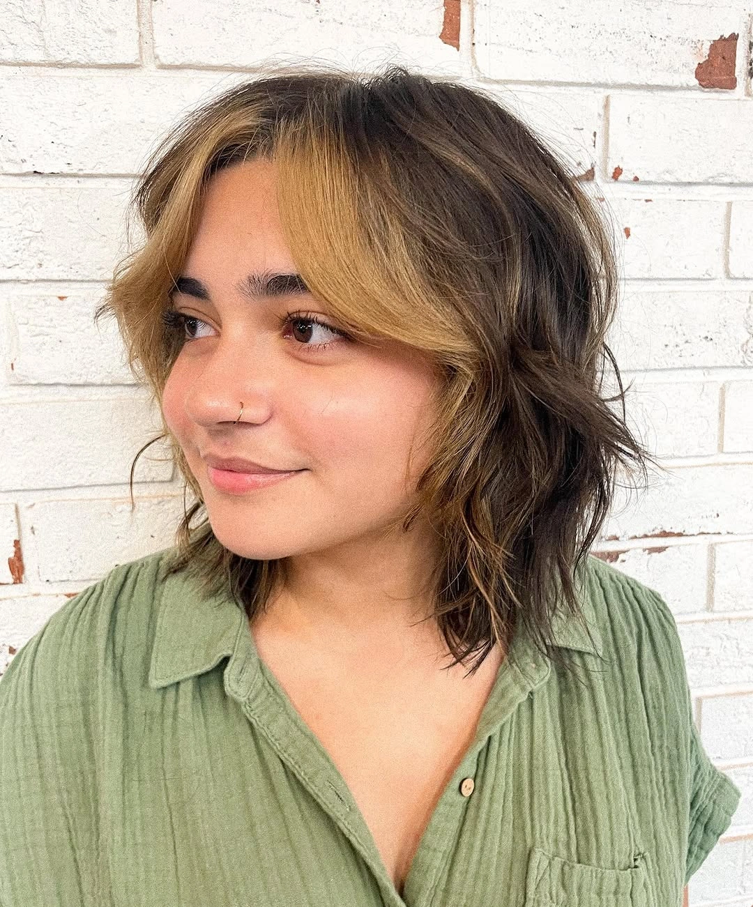 choppy medium layered hair Dimensional Brunette Bob with Bold Face-Framing Blonde